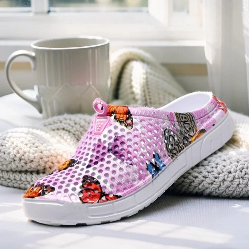 Step into a pastoral dream and bloom with sweet charm! Women's butterfly-printed clogs, with lightweight design and dreamy print