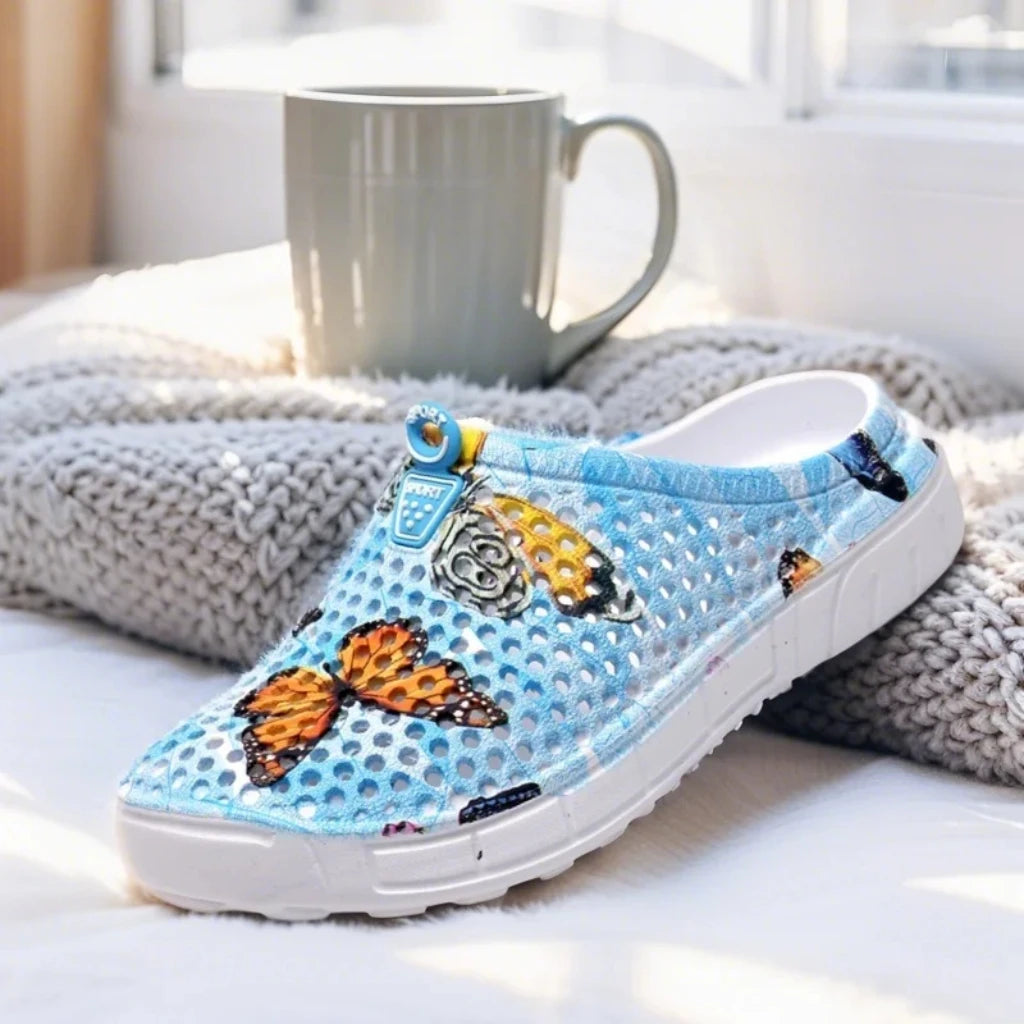 Step into a pastoral dream and bloom with sweet charm! Women's butterfly-printed clogs, with lightweight design and dreamy print