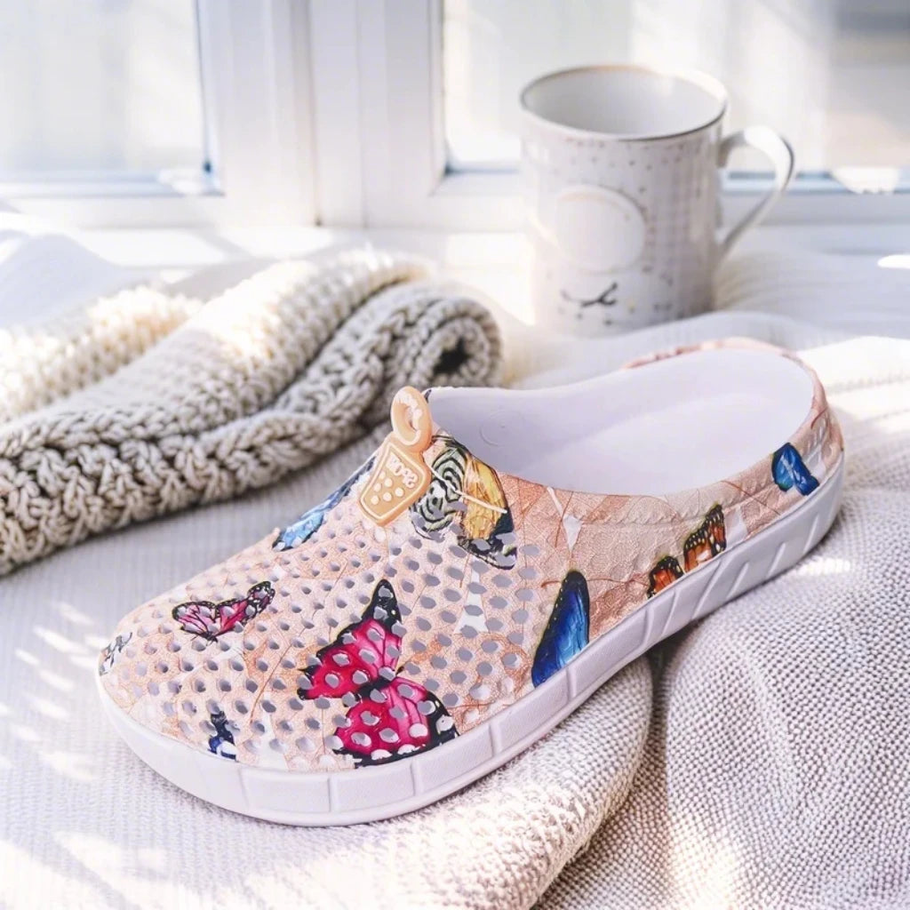 Step into a pastoral dream and bloom with sweet charm! Women's butterfly-printed clogs, with lightweight design and dreamy print