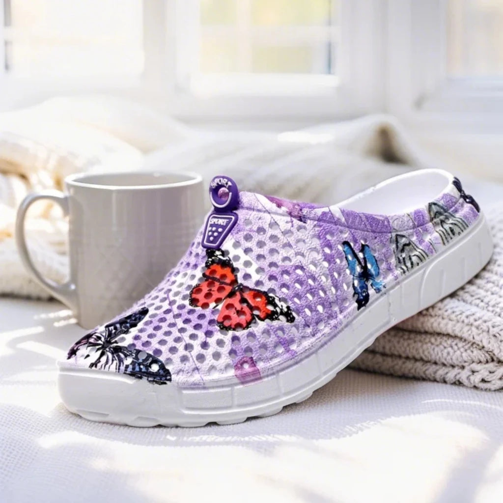 Step into a pastoral dream and bloom with sweet charm! Women's butterfly-printed clogs, with lightweight design and dreamy print