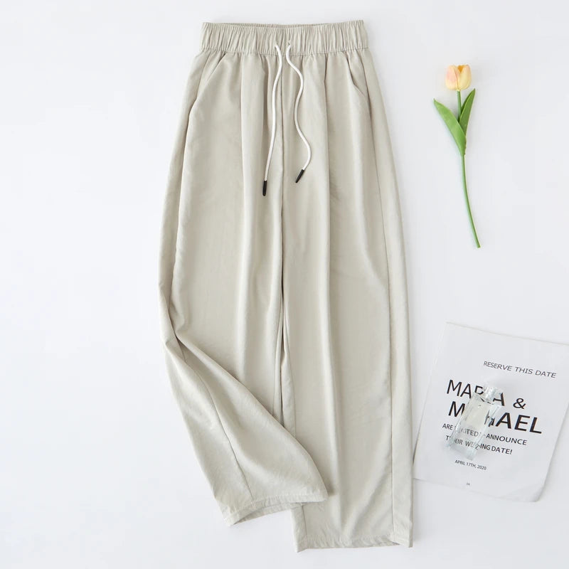 Women's pants with breathable fabric, high waist, comfortable fit, and an elegant commuter style