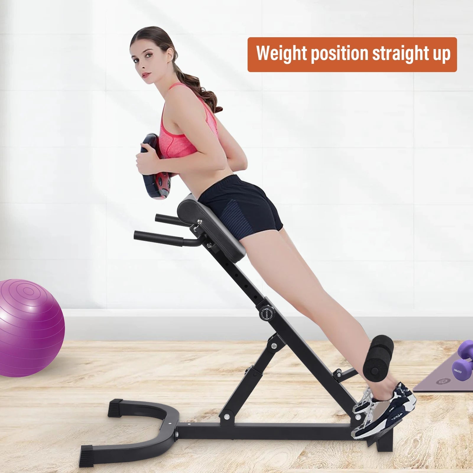 Woman using adjustable roman chair for back extension workout in home gym setting with exercise equipment.